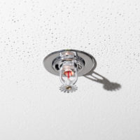 Pictured is a home fire sprinkler on ceiling